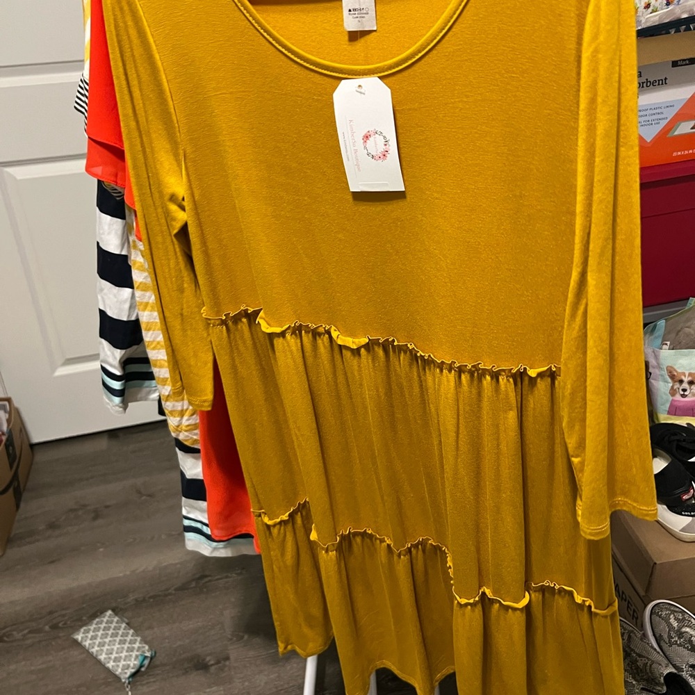 NWT boutique flowy Mustard Yellow women’s Dress with ruffle accents